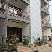Fort Breeze Hotel rooms with balconies situated behind the hotel's main area and reception.
