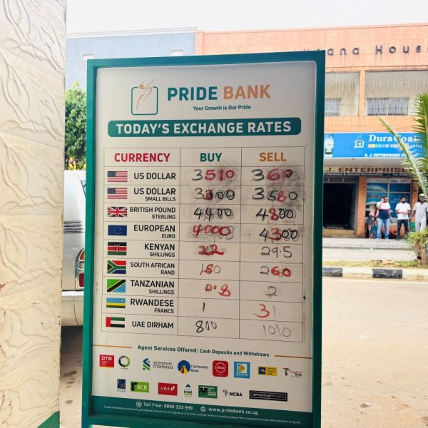 Exchange rates written on a white board