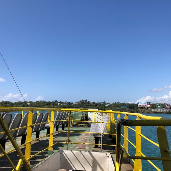 Yellow rails and seats on a ferry