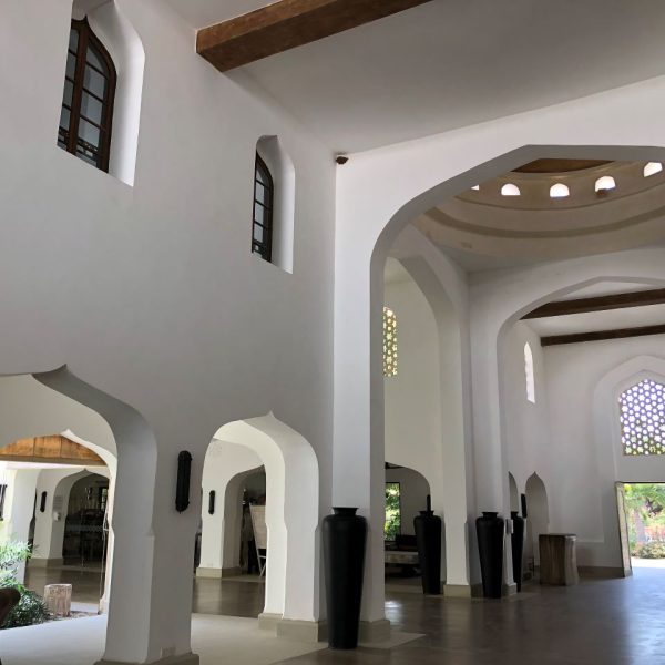 A white interior with curved design 