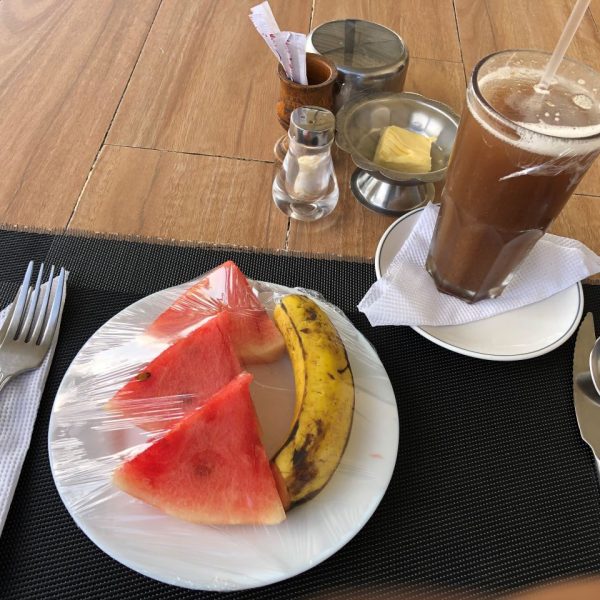 Watermelon and banana on a white plate 