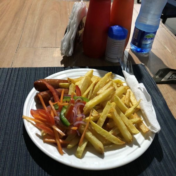 French fries on a white plate 